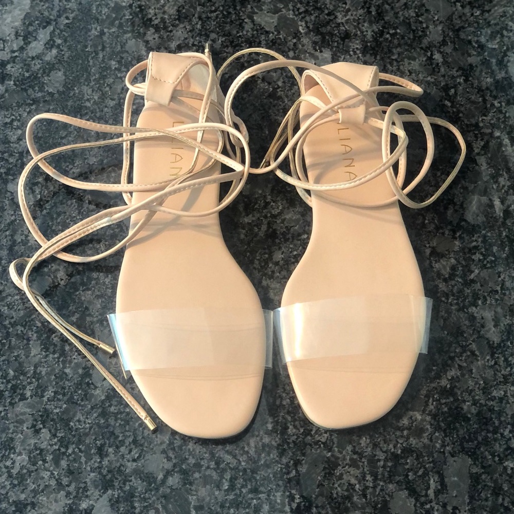 Nude tie up sandals with clear strap